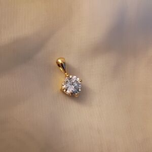 Elegant Gold and Synthetic Diamond Pendant